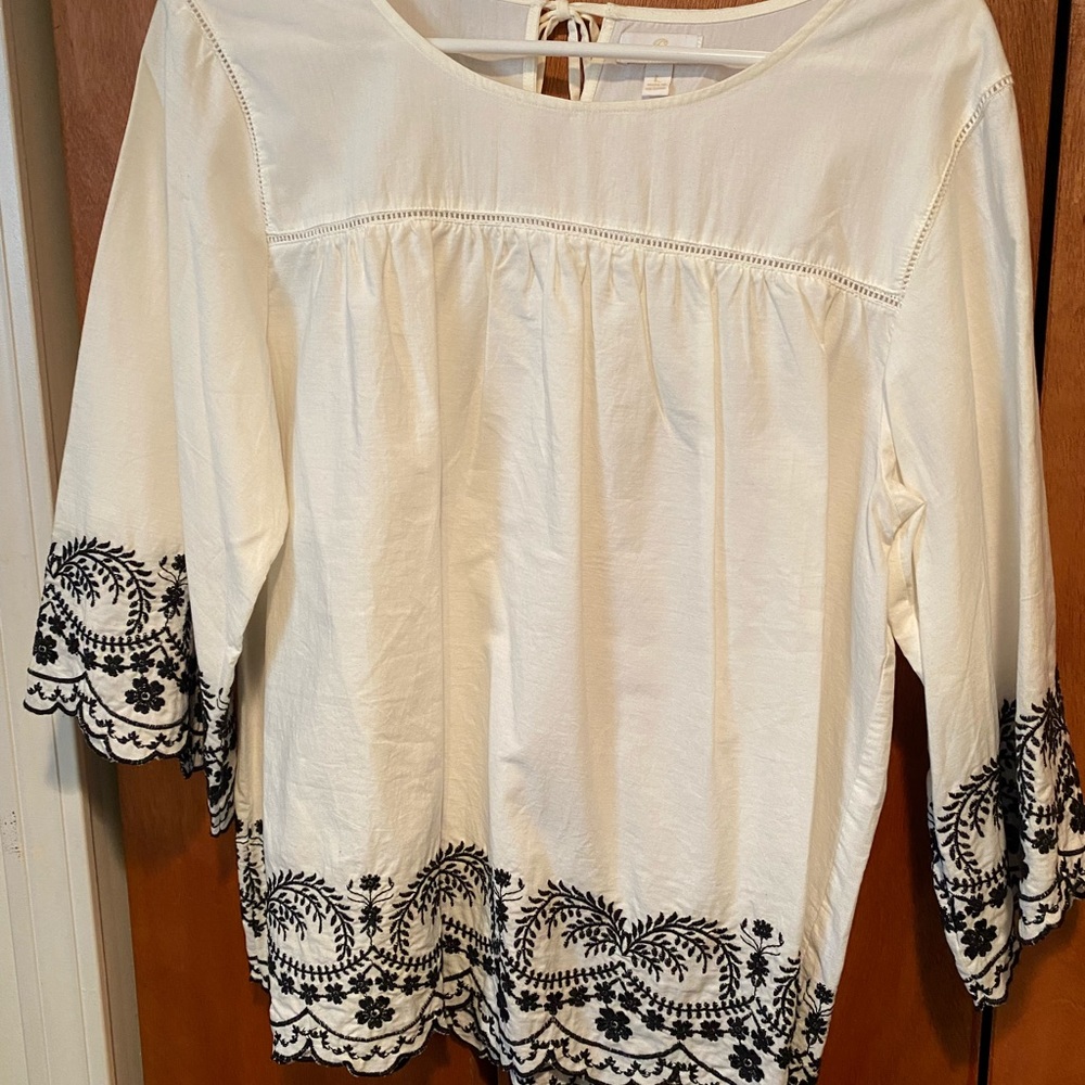 White blouse with black details